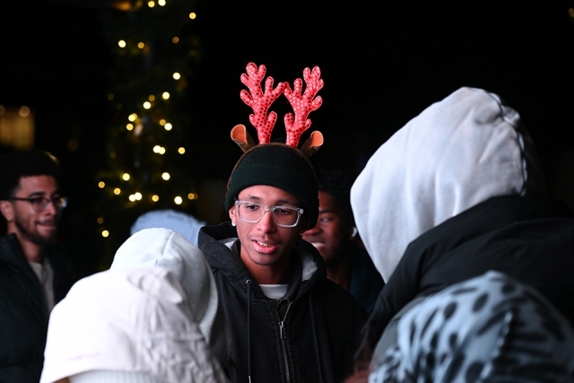 Student with reindeer antlers hat