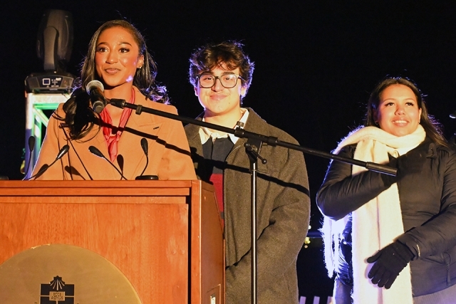 Female student speaking at podium
