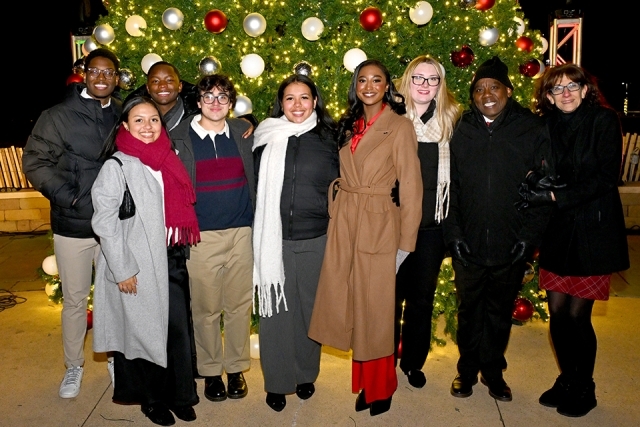Group of Christmas Carnival attendees smiling 