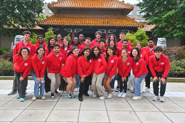 Student peer mentors taking a group photo together.