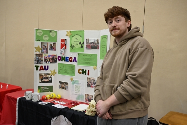 Student in front of a presentation 