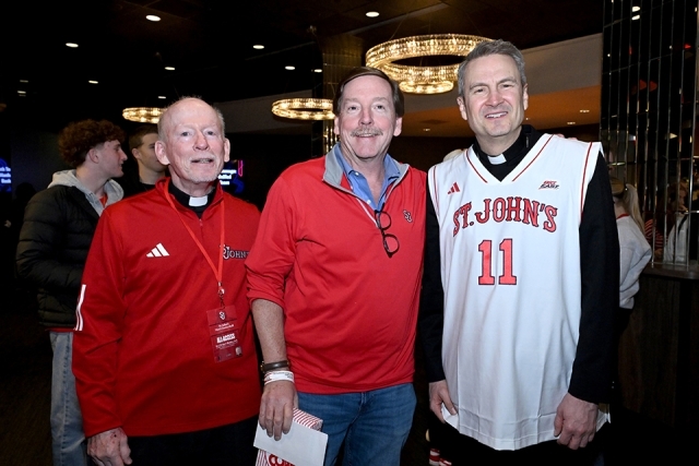Fr. Shanley, male, and Archbishop Hicks