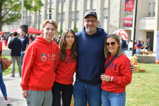 Four people on the great lawn