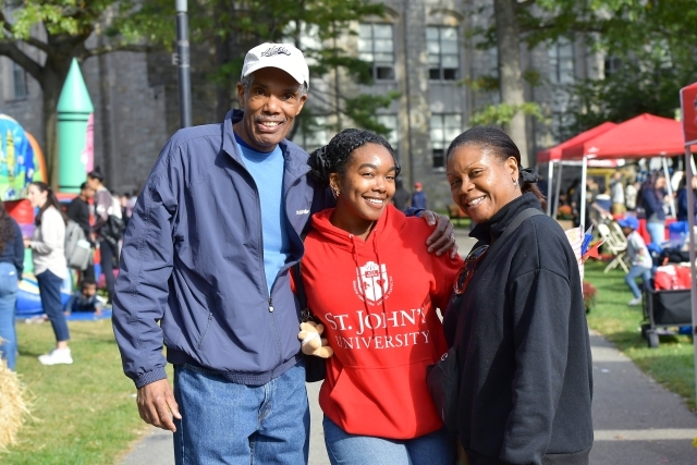 Three people on the Great Lawn
