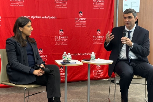 Man speaking in a professional attire 