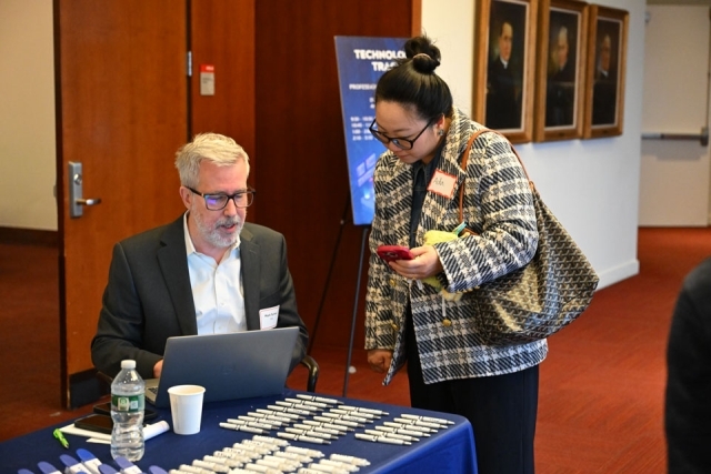 Man speaking attentively to a women 