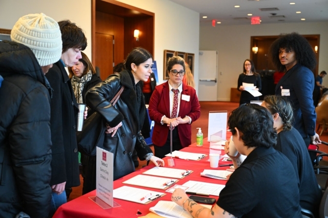People walking around a professional development event 
