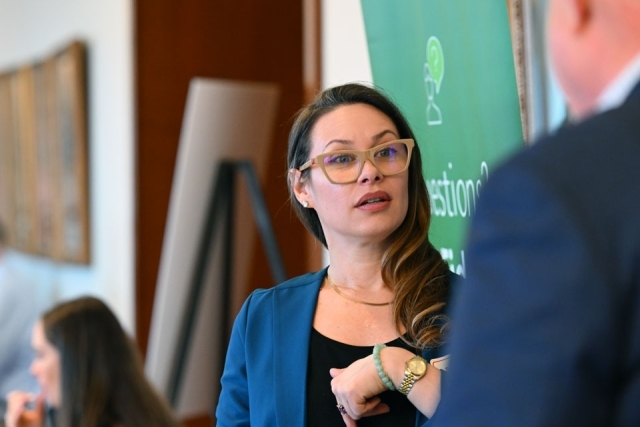 Woman speaking to a man attentively 