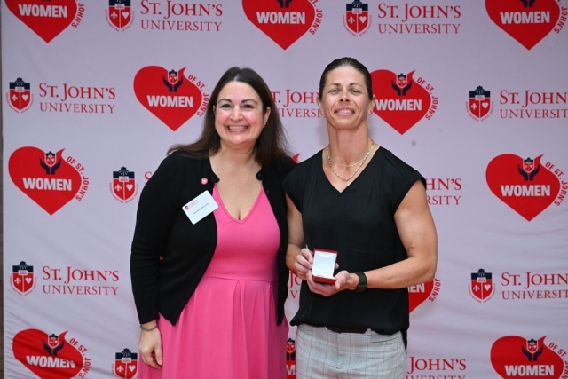 Two woman smiling for photo 