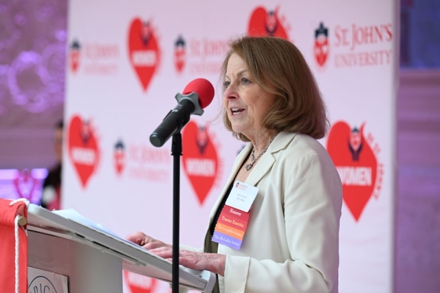 Woman standing at the podium 