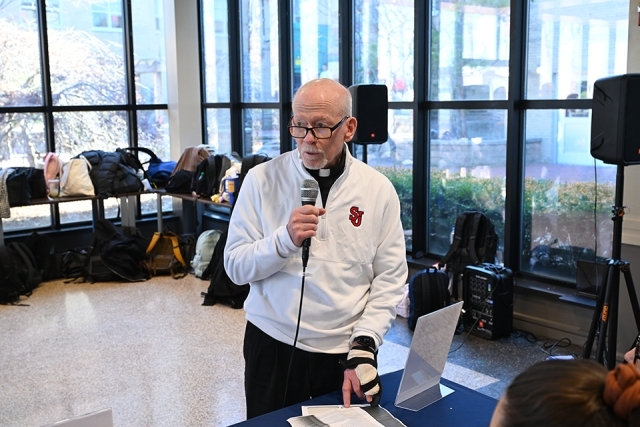 Man speaking in a microphone 