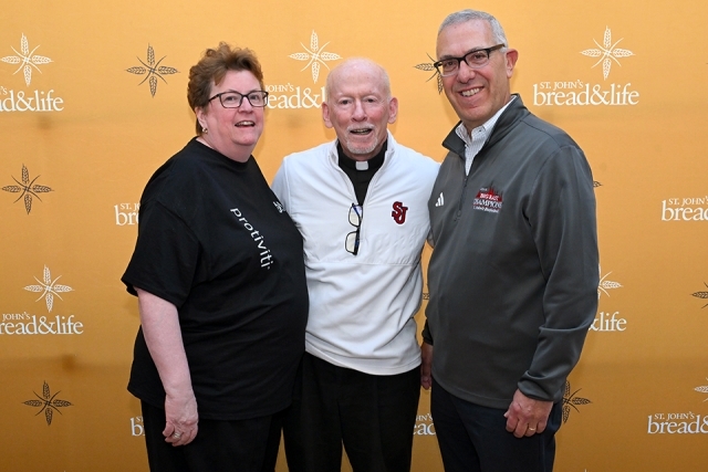 Individuals posing for a photo 