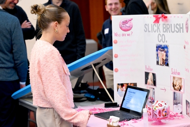 Young woman looking at a computer 