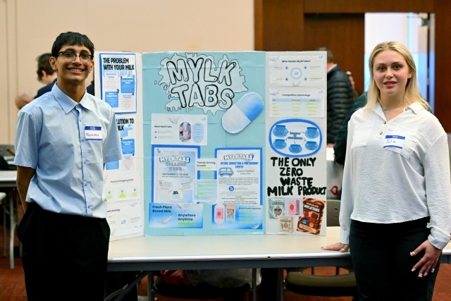 Two woman posing for a photo 