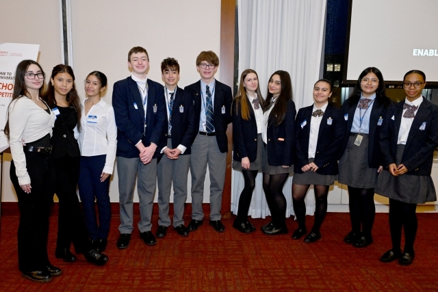 group of individuals posing for a photo 