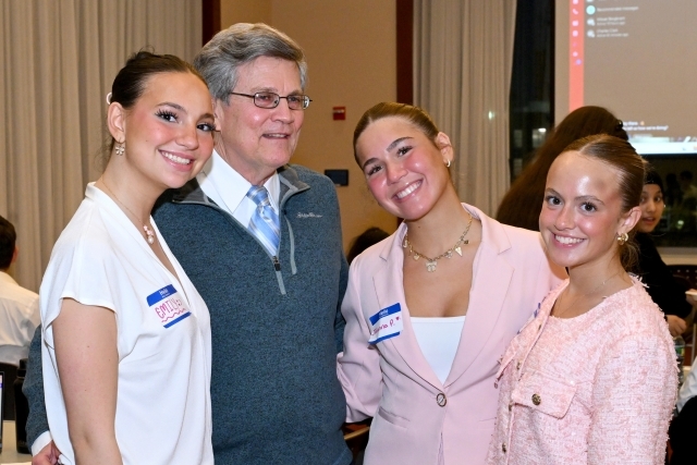 group of individuals posing for a photo 