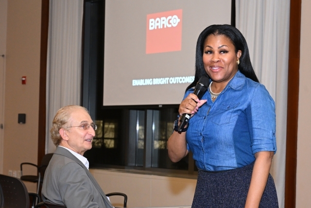 woman speaking in a microphone