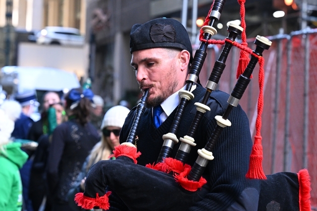 Bagpiper performing during a St. Patrick’s Day parade in New York City