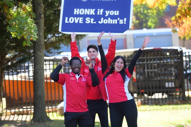 students cheering for St. Johns