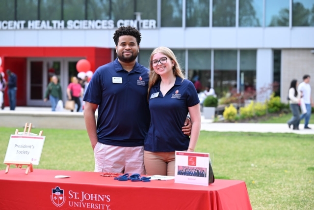St. John's Student Staff at a tabling 