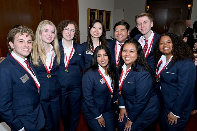 Group of people at President's Society event at St. John's 