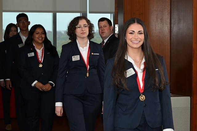 Student Honorees walking at President's Society event at St. John's 