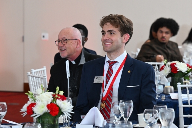 Group of people at President's Society event at St. John's 