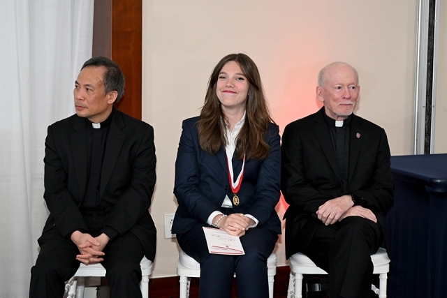 Photo of Honoree and father shanley at President's Society event at St. John's 