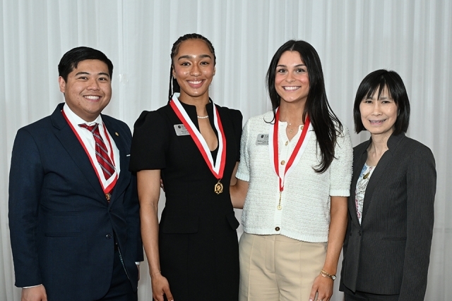 People posing at the President's Society event at St. John's 