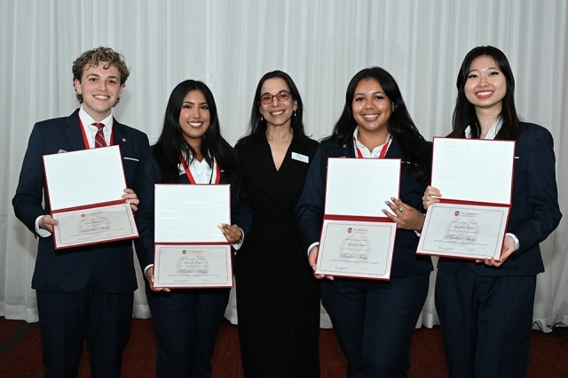 People posing at the President's Society event at St. John's 