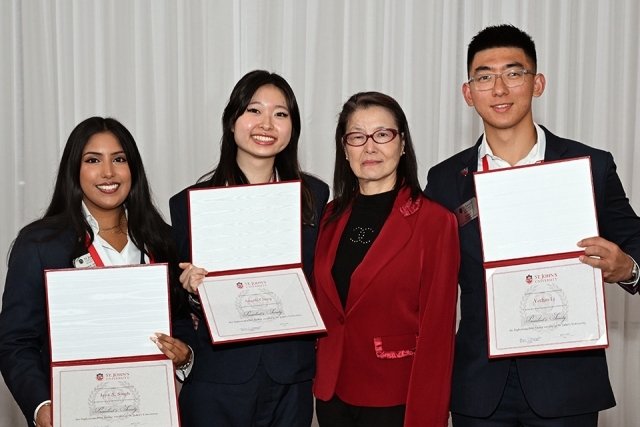 People posing at the President's Society event at St. John's 
