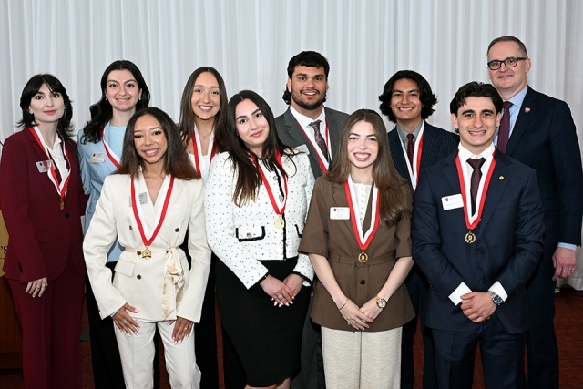 People posing at the President's Society event at St. John's 