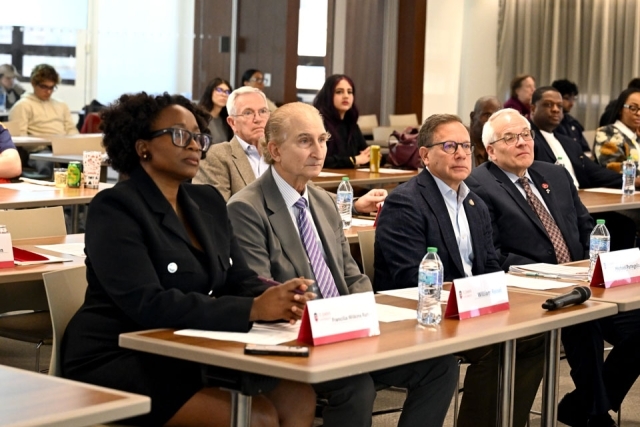 Panel of judges seated