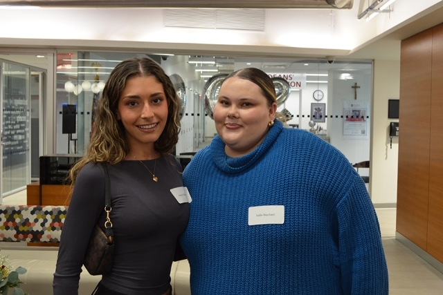 Two people smiling for photo 