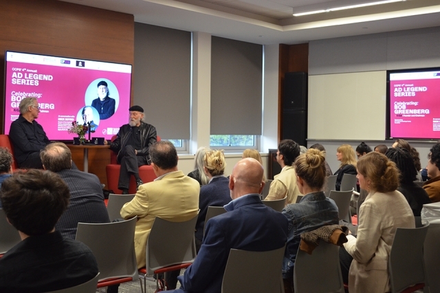 Group of people listening to presentation 