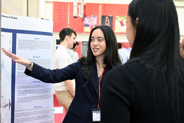 Student researcher presenting