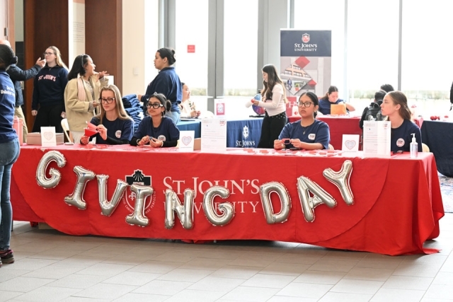Giving Day donation table inside D'Angelo Center
