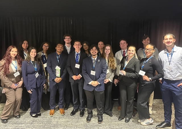 Grop of college students dressed in professional attire