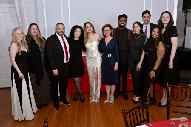 Faculty, staff, alumni, and guests gather for a group photo during the College of Pharmacy and Health Sciences awards gala.