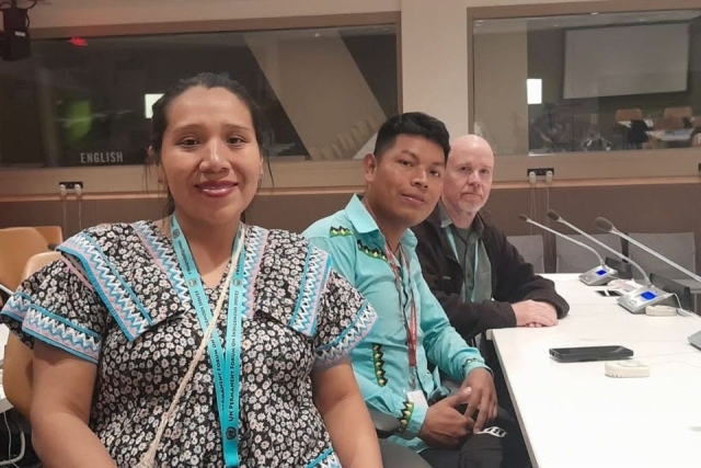 Father Fitzgerald sits with Indigenous Ngäbe representatives at the United Nations Indigenous Forum in 2024.