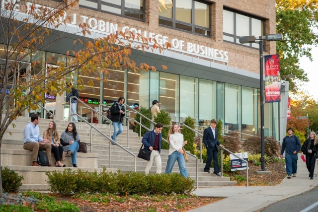 St. John's students on the the steps in front of The Peter J. Tobin College of Business.