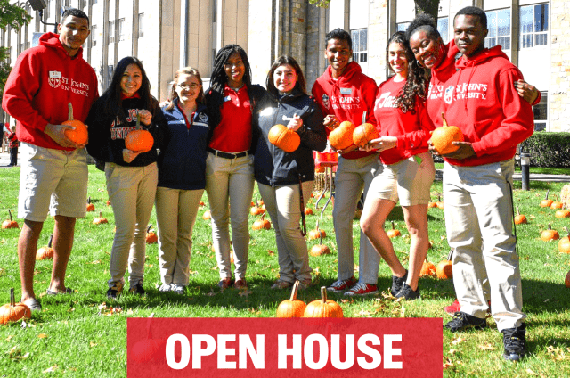 St. John's University Students Holding Pumpkins for Open House