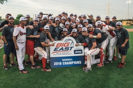 2018 St. John's Baseball Team holding BIG EAST sign
