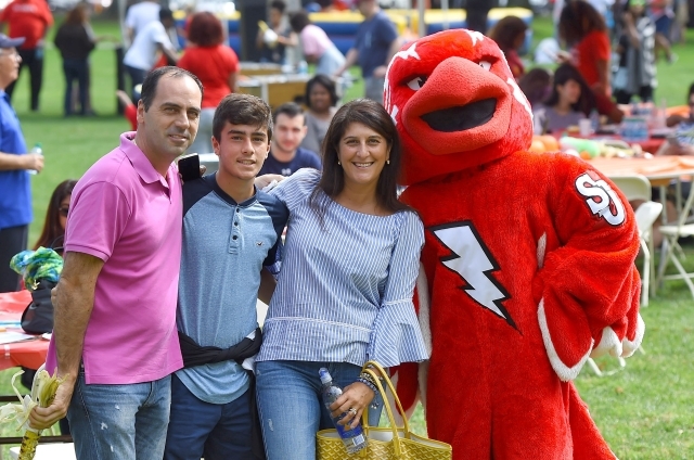  Family poses for a photo with Johnny Thunderbird