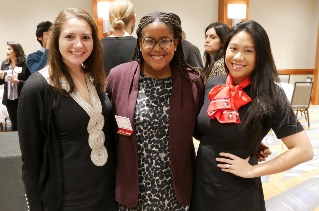 three woman looking straight at the camera