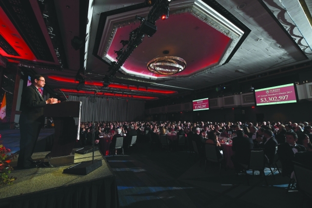 Conrado “Bobby” Gempesaw, Ph.D., President, St. John’s University, announces record-level funds for student scholarships at the 