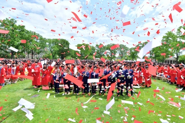 Confetti with graduates in the background