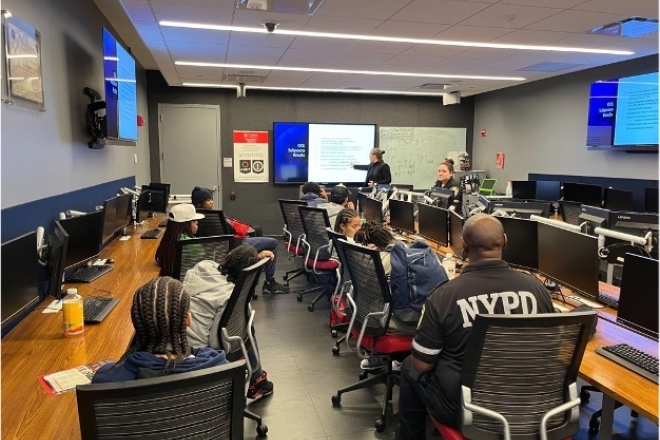 Dr. Suzanna Schmeelk teaches the explorers about Cybersecurity
