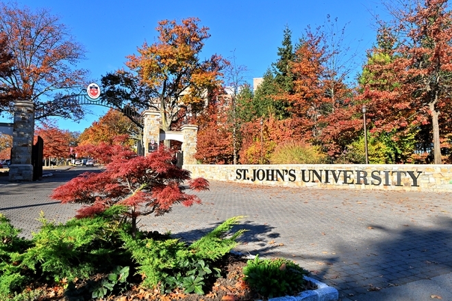 Gate 1 of the Queens Campus during fall