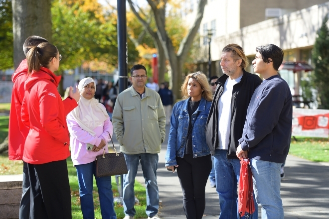 St. John's ambassadors speaking to prospective students and parents about the admissions process